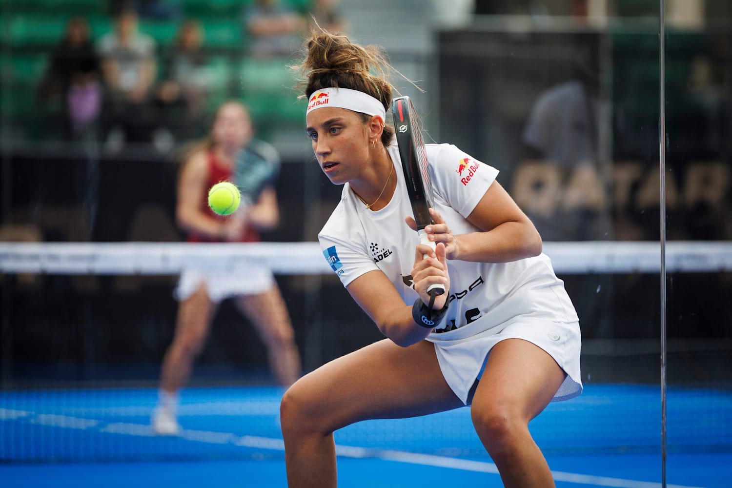 Professional padel player in tournament action